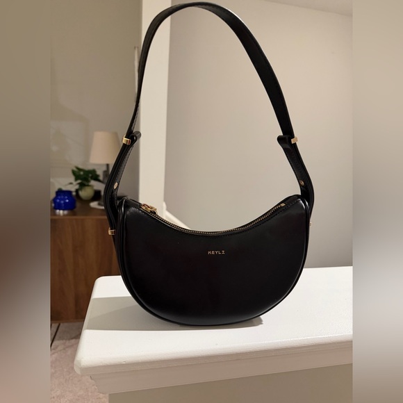 Keyli Handbags - Keyli NWOT Black Crescent Shoulder Bag with Gold Accents
